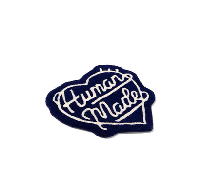 “Human made” heart rug