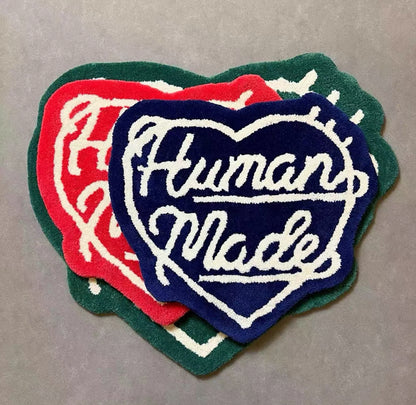 “Human made” heart rug